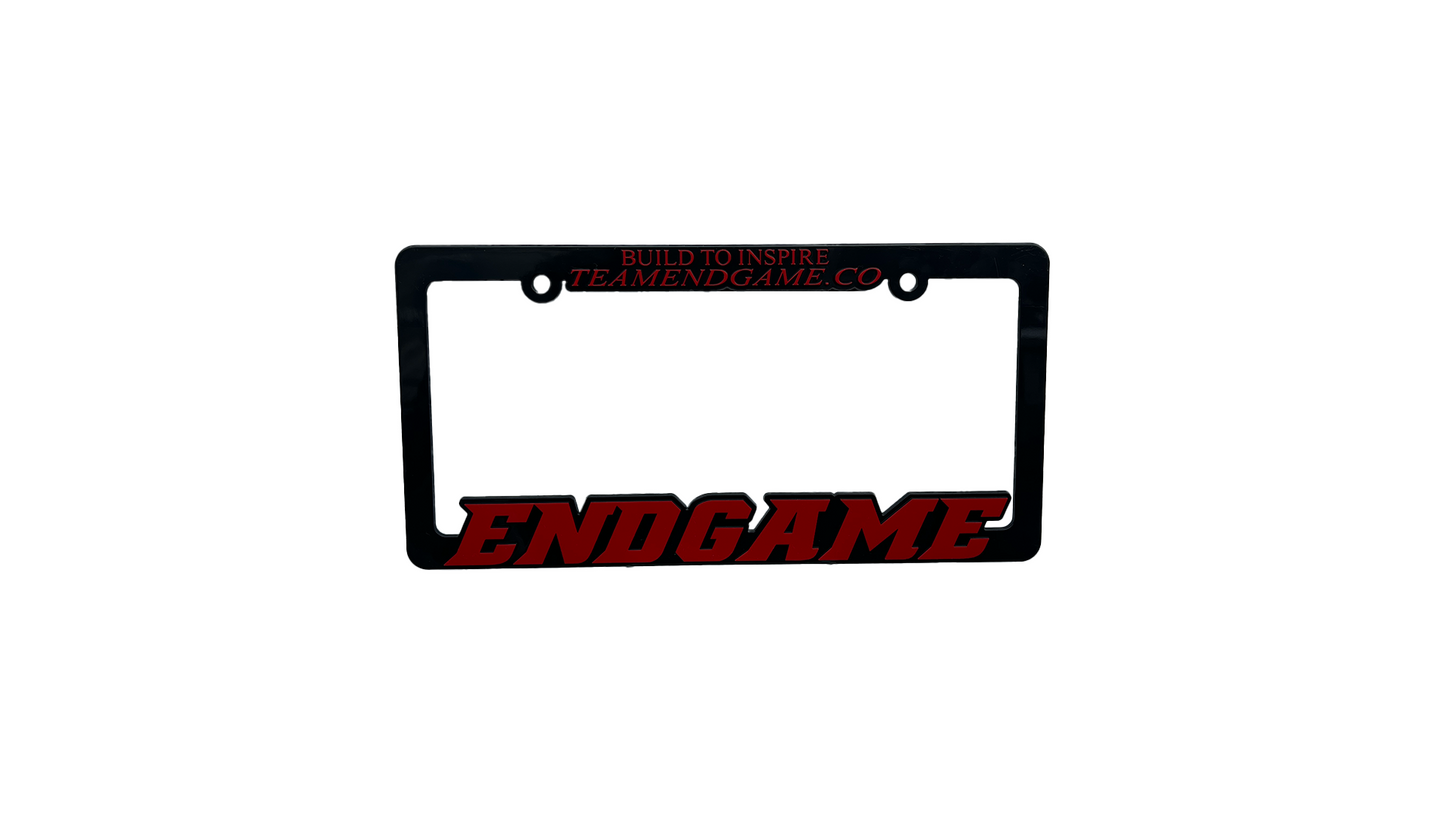 LICENSE PLATE FRAME - BUILD TO INSPIRE (RED/BLACK)